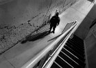 HomelessCount--5-BW copy  Susan Sutton, senior patrol officer with the Spartanburg Public Safety Department, looks inside a stairwell for homeless individuals, in downtown Spartanburg early Tuesday morning, 2-6-07. The city surveyed the homeless for an annual count.  (NOTE: with Christine Boush story)